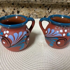 Handcrafted Clay Mugs with Blue Floral Design